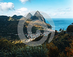Soufriere, St Lucia from an overlook with the world famous Pitons in the background and beautiful blue Caribbean waters