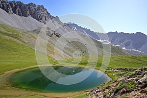 Souliers lake located above Izoard Pass after one hour hike from Casse deserte car park photo