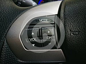 Sound control botton on steering wheel