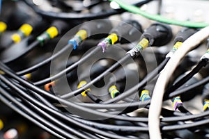 Sound control panel. Large quantities of XLR connectors and wires.