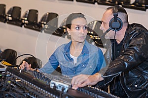 sound engineers at controls