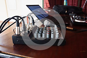 Sound mixer on a table in a recording studio, close-up photo