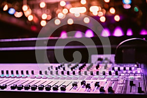 Sound recording studio mixer desk at a concert: professional music recording