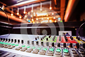 Sound recording studio mixer desk at a concert: professional music recording