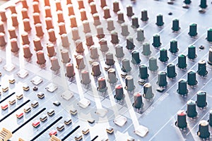 Sound recording studio mixing desk with engineer or music producer