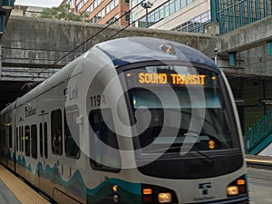 Sound Transit Link light rail pulling into outdoor station