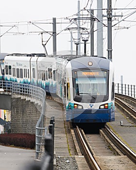 Sound Transit Link light rail train approaching with service to Northgate