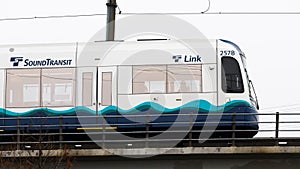 Sound Transit Link light rail train on elevated track passing by