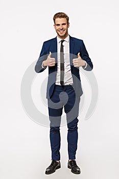 Sounds good I am in. Vertical full-length shot good-looking male entrepreneur in classic elegant suit, tie, showing
