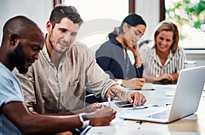 That sounds important. a group of business colleagues having a strategy meeting in the boardroom.