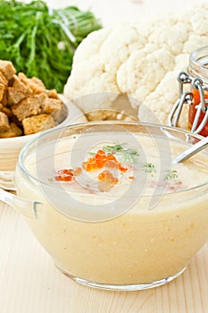 Soup cauliflower puree with red caviar