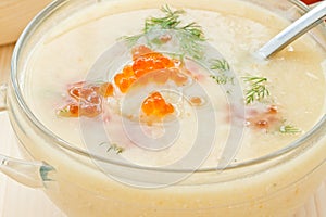 Soup cauliflower puree with red caviar