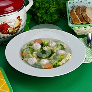 soup with chicken meatballs and vegetables