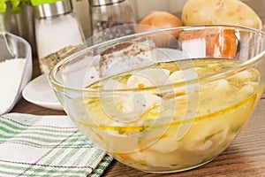 Soup with dumplings and ham