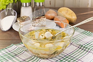 Soup with dumplings and ham