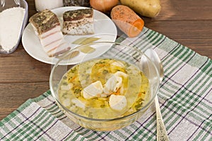 Soup with dumplings and ham