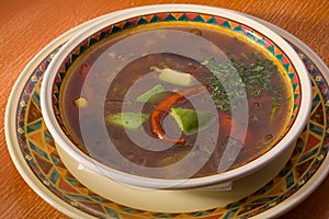 Soup with meat, avocado and cabbage photo