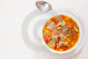 Soup with meat, rice and vegetables