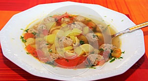 Soup with meatballs and pasta