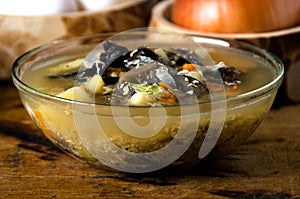 Soup mushrooms glass bowl spoon