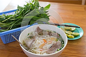 Soup pho with beef in a restaurant in Saigon