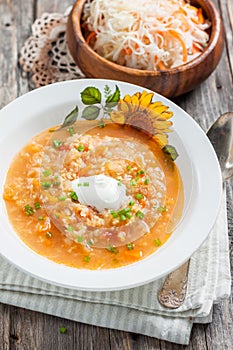 Soup with sauerkraut and millet