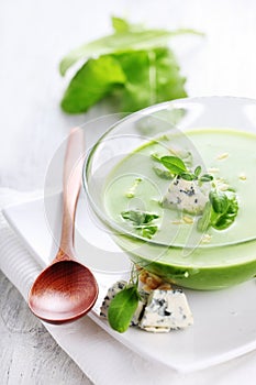 Soup with spinach and gorgonzola photo