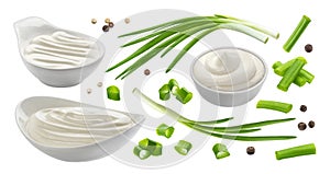 Sour cream and chives isolated on white background, green onion with sour cream sauce photo