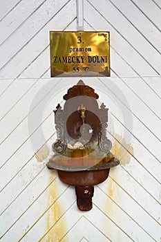 Source of thermal mineral water No. 3 Lower castle` in Karlovy Vary, the Czech Republic. Czech text `Source lower castle`