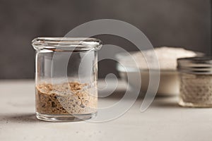 Sourdough for bread is active. Homemade rye grain flour sourdough. Starter leaven. Healthy eating concept. Copy space