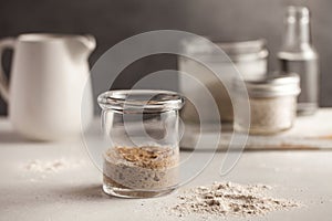 Sourdough for bread is active. Homemade rye grain flour sourdough. Starter leaven. Healthy eating concept. Copy space