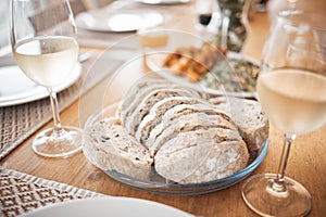 Sourdough bread, food and lunch meal for fine dining, eating and dinner table in house, restaurant and cafe. Closeup