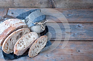 Sourdough bread and starter jar