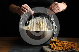 The sourdough dough is bubbling and stretchy. Traditional fermentation with yeast photo