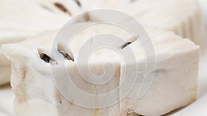 soursop fruit on a plate on table