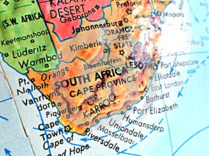 South Africa focus macro shot on globe map for travel blogs, social media, website banners and backgrounds.