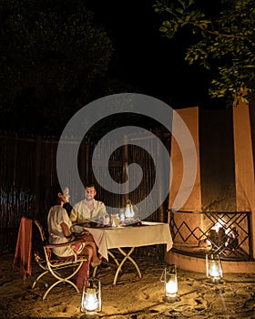 South Africa Kwazulu natal, luxury safari lodge in the bush , couple dinner at night