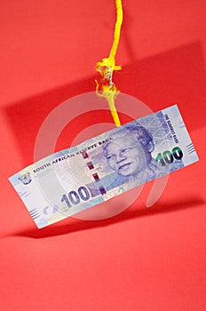 South-Africa rand cash note hanging by a thread