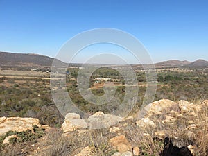 South Africa scenic bushveld landscape photograph under a blue sky