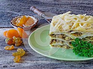 South African bobotie dish layered with pancakes