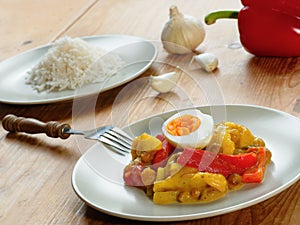 South African curry with vegetables, fruit and eggs