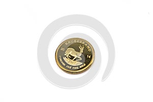 A South African krugerrand close up on a white background