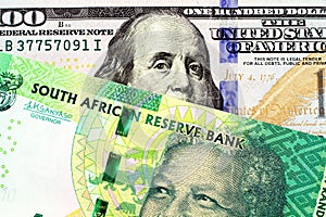 A South African Ten Rand Bank Note With An American One Hundred Dollar Bill