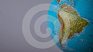 South America map on a globe with a white background