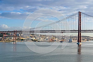South bank of the Tagus river and the 25 de Abril Bridge of Lisbon, capital of Portugal