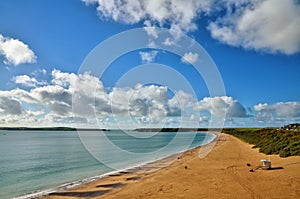 South Beach Tenby, with Caldey island.