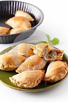 South east Asia origin food concept homemade chicken Curry puffs on white background with copy space