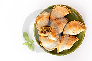South east Asia origin food concept homemade chicken Curry puffs on white background with copy space