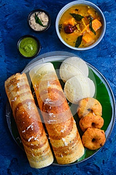 South Indian breakfast Idli dosa vada with chutney and sambhar photo