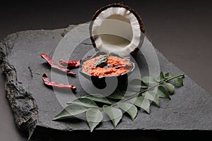 South indian coconut chutney with curry leaves and red chillies